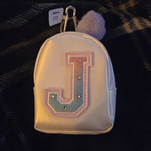 Claire's Mini Cream Backpack with J Patch